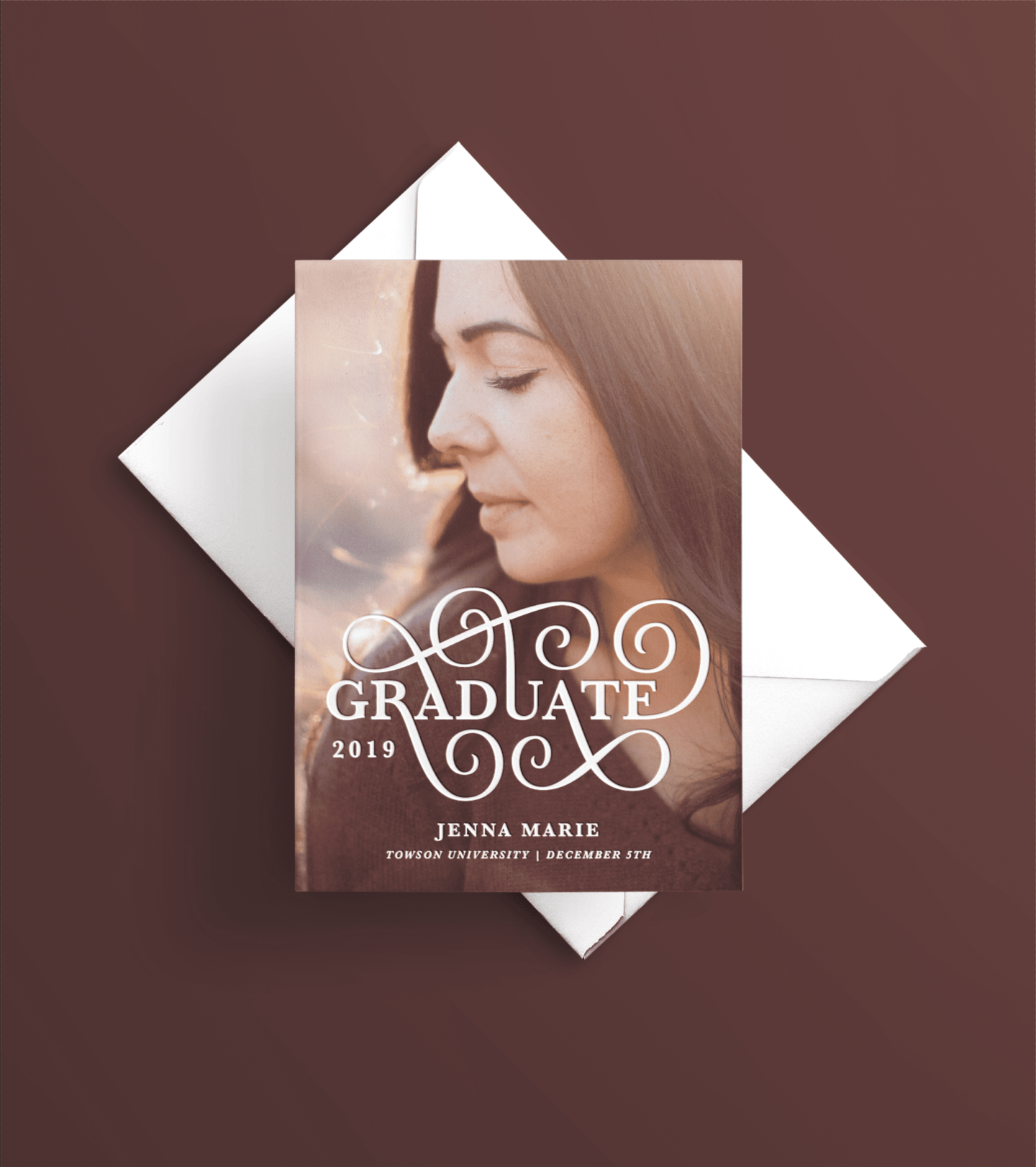 custom lettering that says graduate on a photo of woman